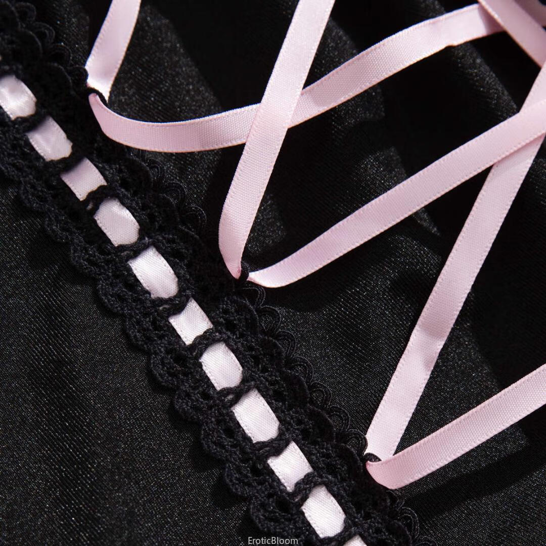 Close-up of Black Lace Corset Lingerie Set with pink ribbon lacing and crochet trim, showcasing French maid style and seductive detailing.