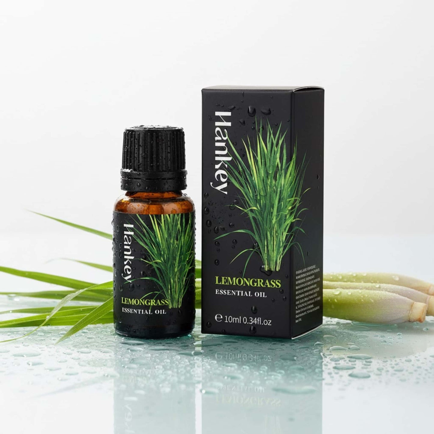 Lemongrass aroma oil bottle with fresh lemongrass stalks and water droplets, highlighting its refreshing and stimulating qualities.