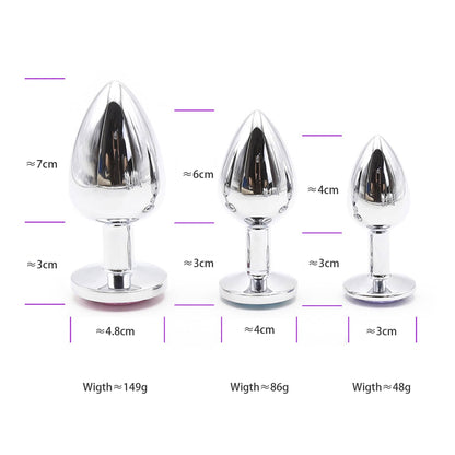 Set of three metal anal plugs (small, medium, large) with dimensions: Small (4cm L, 3cm base, 48g), Medium (6cm L, 4cm base, 86g), Large (7cm L, 4.8cm base, 149g)