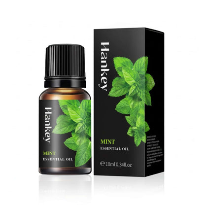 Mint Essential Oil bottle and its black packaging box displayed on a pure white background for e-commerce.
