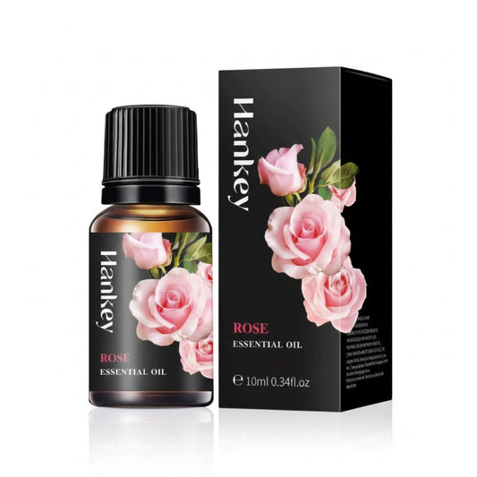 Rose Essential Oil bottle and its black packaging box displayed on a pure white background for e-commerce.