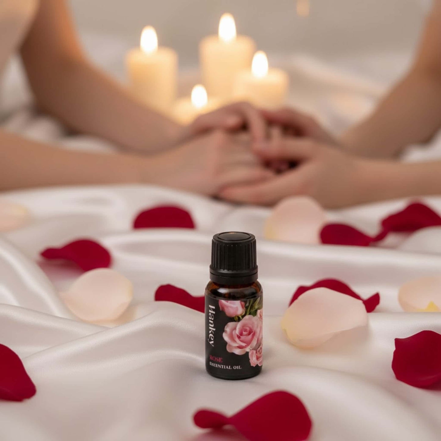 Rose romantic sensual oil in the foreground, with blurred figures in the background showing deep loving connection and romance.