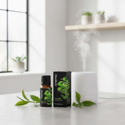 Tea Tree purifying sensual oil bottle with a minimalist diffuser and fresh tea tree sprigs, creating a clean, invigorating, and confident intimate atmosphere.