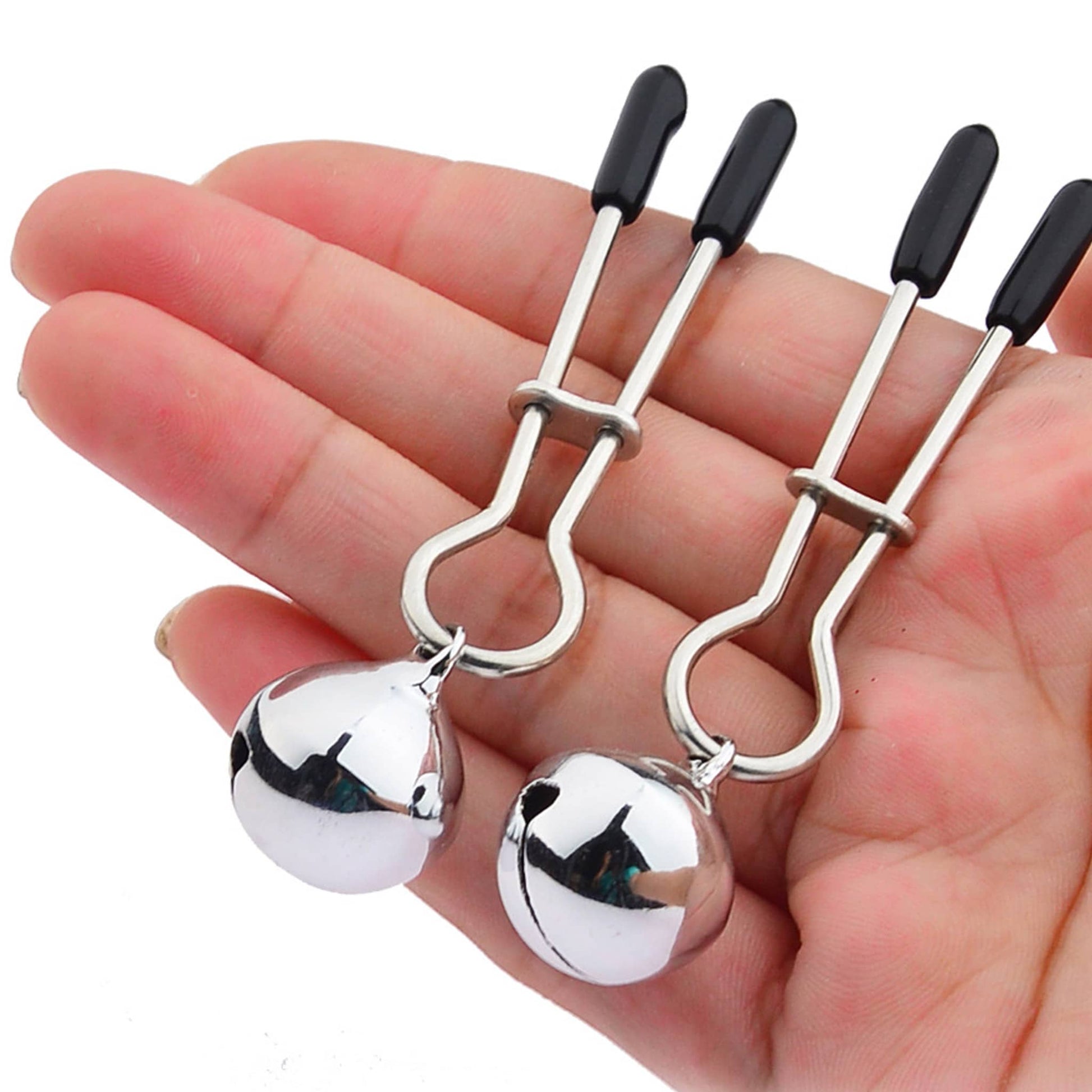 V-Clip Nipple Clamps with Black Rubber Tips and Silver Bell Pendants for Teasing and Sensory Play in hand